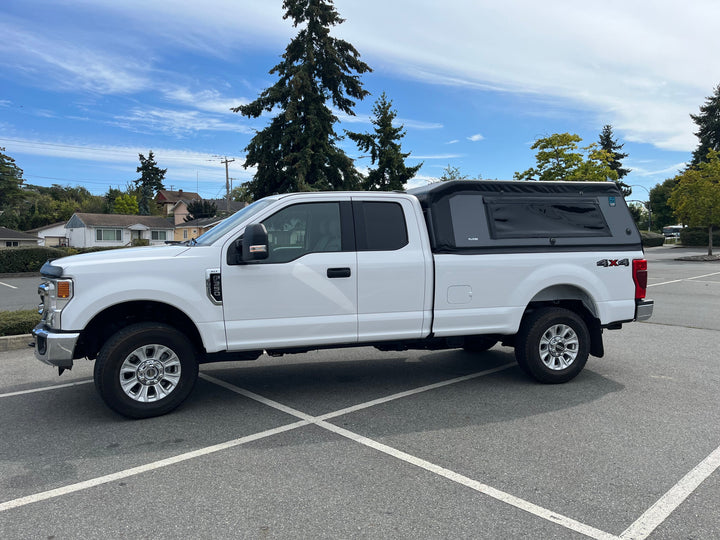 The Anti-Topper Manifesto: Why Your Truck Deserves Better Than a 200-Pound Ball and Chain
